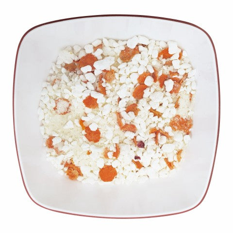 Schonkost-Mischung mit Hüttenkäse und Kartoffel: orange Stückchen in der Schale